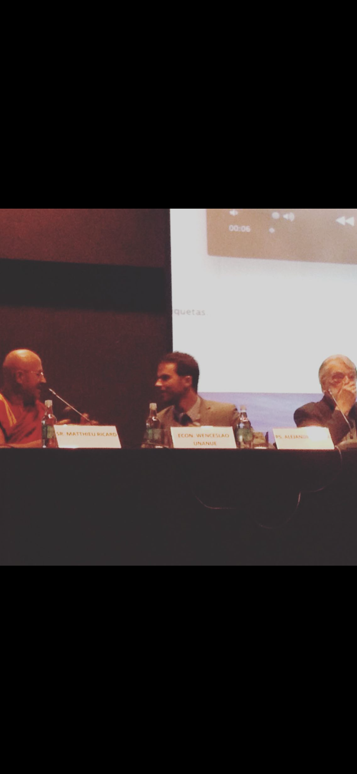 Sharing a panel with Matthieu Ricard on wellbeing, science and policy · Santiago, Chile
